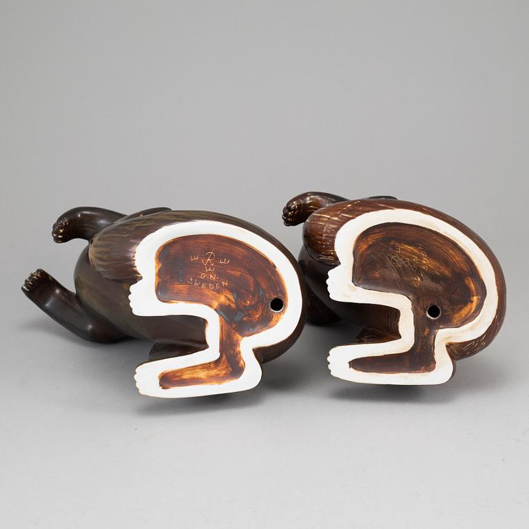 GUNNAR NYLUND, two otter stoneware figurines from Rörstrand.