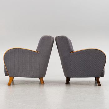 Easy chairs, a matched pair, first half of the 20th century.