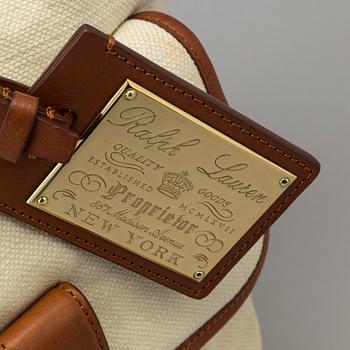 A white canvas and leather proprietor bag by Ralph Lauren.
