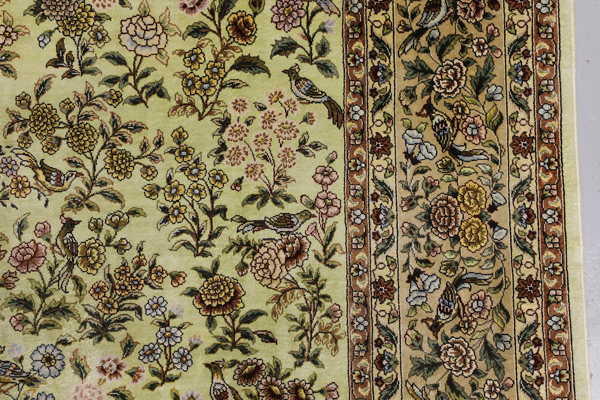 An Oriental silk rug, approx. 124 x 183 cm.