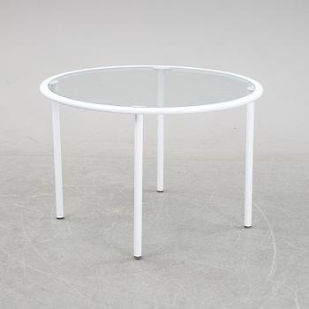 Giandomenico Belotti, attributed to, a griddled glass and metal dining table, by Fly Line, Italy, 1970s.