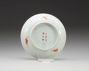 A famille rose dish, presumably late Qing dynasty, with Guangxu six character mark.