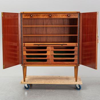 A mid 20th century mahogany veneered cabinet, Bodafors.