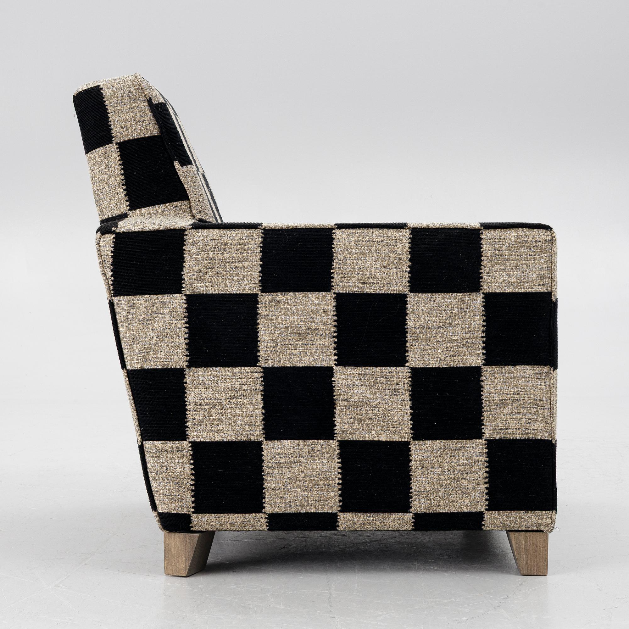 A 'Caspian Club Chair' by RIJD, contemporary.