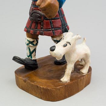 a Tintin and snowy wood scuplture from the second half of the 20th century.