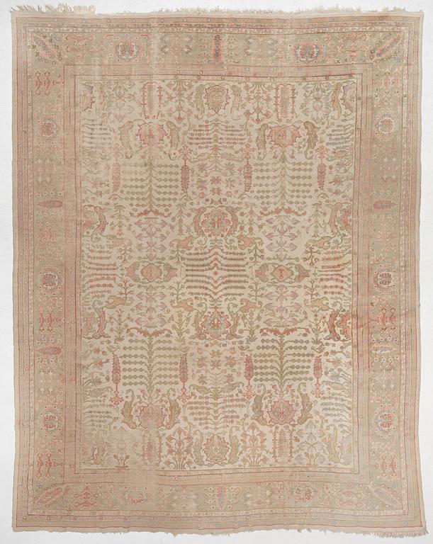 An antique Ushak carpet, West Anatolia, c. 486 x 391 cm.