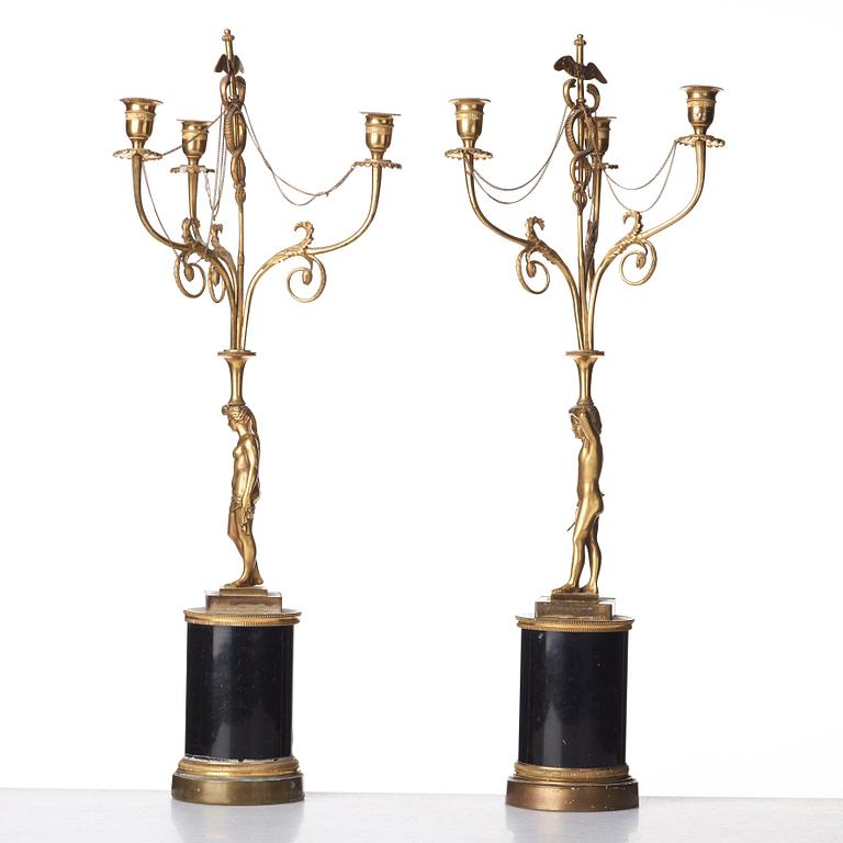 A pair of late Gustavian three-light chandeliers, circa 1800.