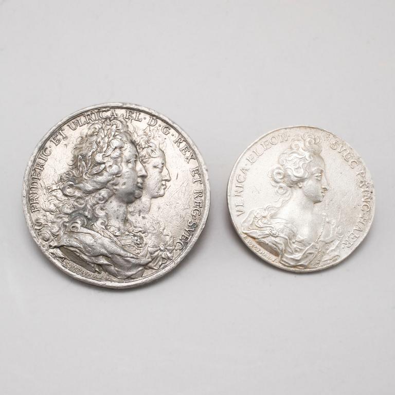 Two pewter medallions, 18th century.