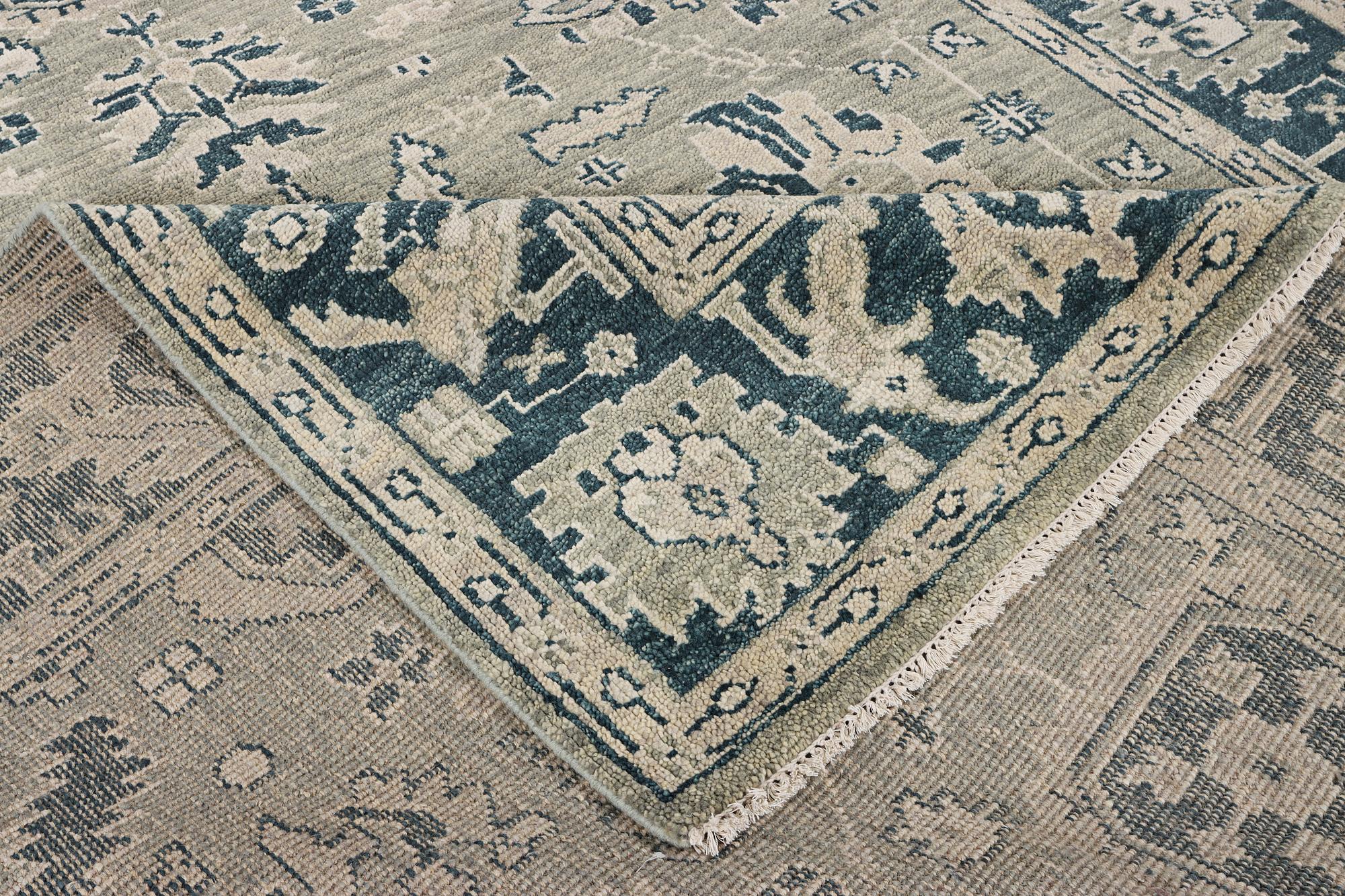 An oriental carpet with Mamluk design, c. 372 x 277 cm.