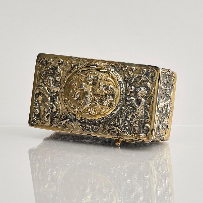 Music box. gilded 800 silver. Germany, late 19th/early 20th century.