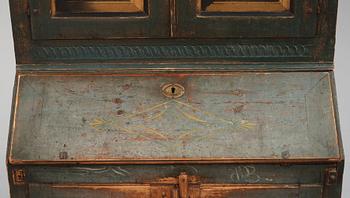 A polychrome-painted writing-cabinet attributed to J. Bäckström (1773-1837), dated 1828.