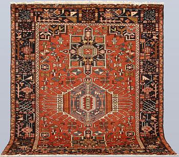 A Heris rug, approx. 191 x 157 cm.