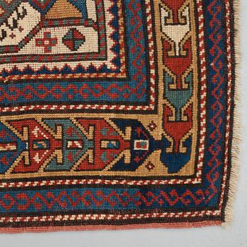 A RUG, an antique Caucasian prayer rug, Czar Russia, ca 144-151 x 103-106 cm.