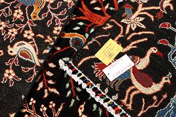 A Khorjin carpet, c. 295 x 248 cm.