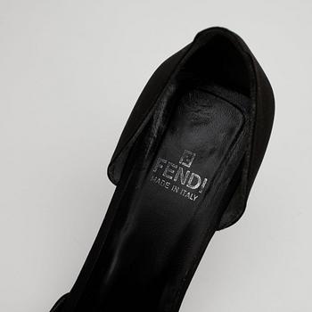 FENDI, a pair of black embellished pumps.
