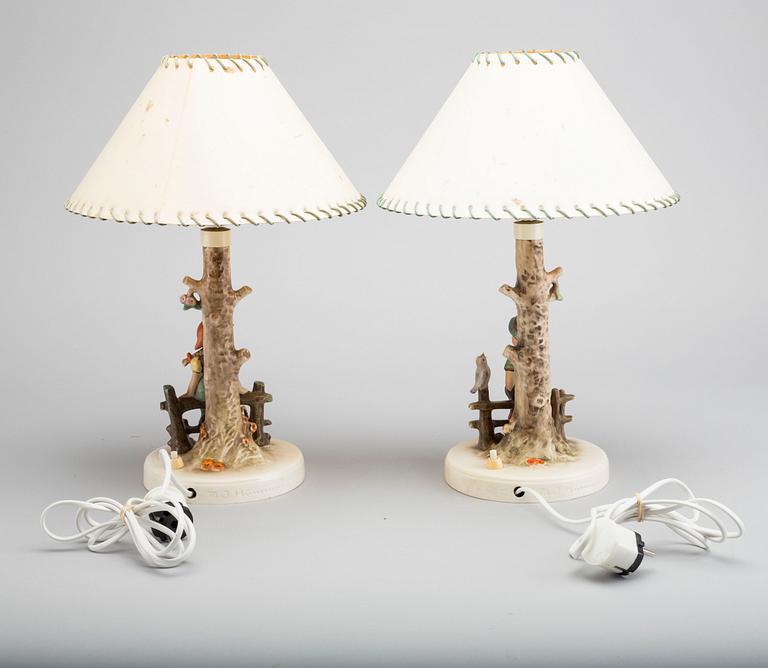 MARIA INNOCENTIA HUMMEL, a pair of porcelain lamps.