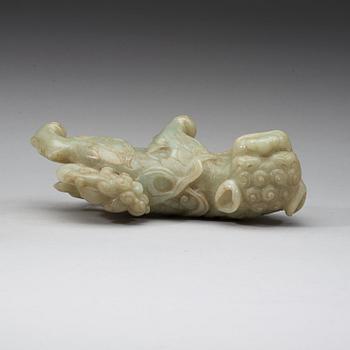 A green nephrite mytological lion, 20th century.