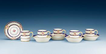 1254. A set of five "Sèvres" cups with stands, France, 18th Century. (5).
