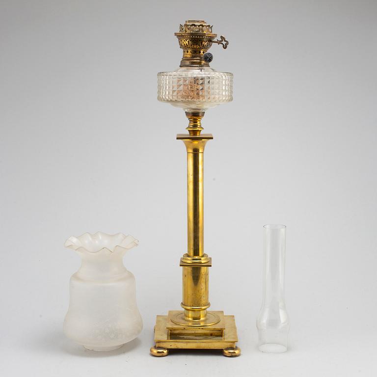 A brass oil lamp, late 19th Century.