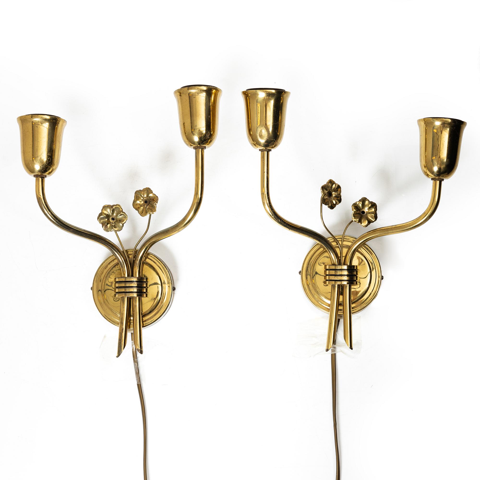 A pair of Scandinavian Modern wall lamps, 1940s.