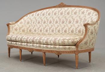 A Louis XVI 18th century sofa. Two later armchairs included.