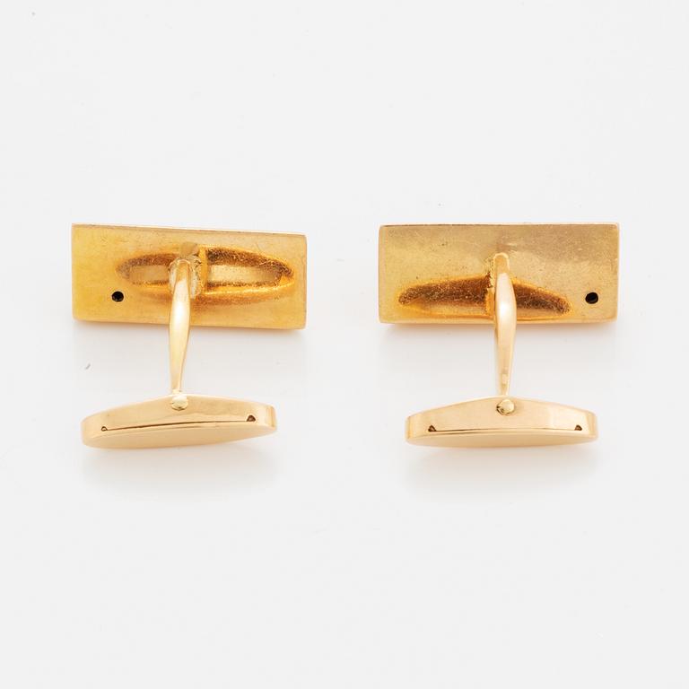 Cufflinks, 1 pair, 18K gold with 2 rectangular cut emeralds.