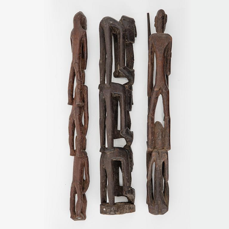 Three wooden Asmat scultpures, Indonesia, Jakarta, 20th Century.