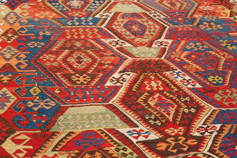 A carpet, antique/semi-antique Anatolian kilim, ca 292-301 x 125-135 cm.