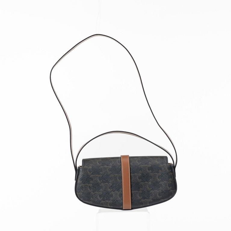 Céline, Bag "Tabou Clutch on Strap".