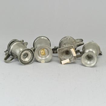 Eight pewter mustard pots, 18th/19th century.