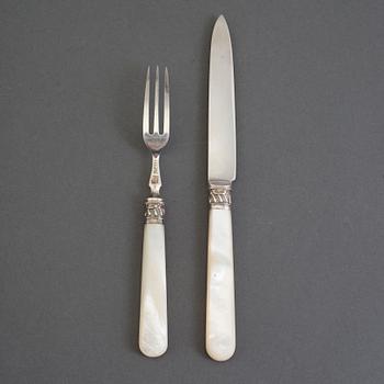 A set of 24 silver and mother of pearl cutlery by  Frederick C. Asman & Co, Sheffield, England, 1907.