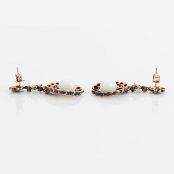 A pair of silver and gold earrings set with pearls and rose-cut diamonds.