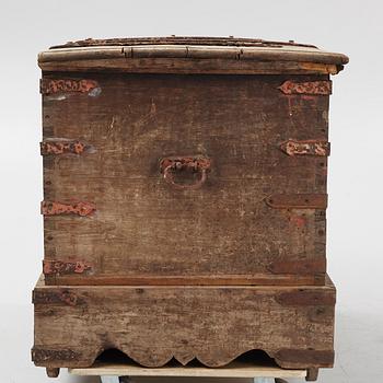 A carved oak chest with wrought iron fittings, 19th Century.