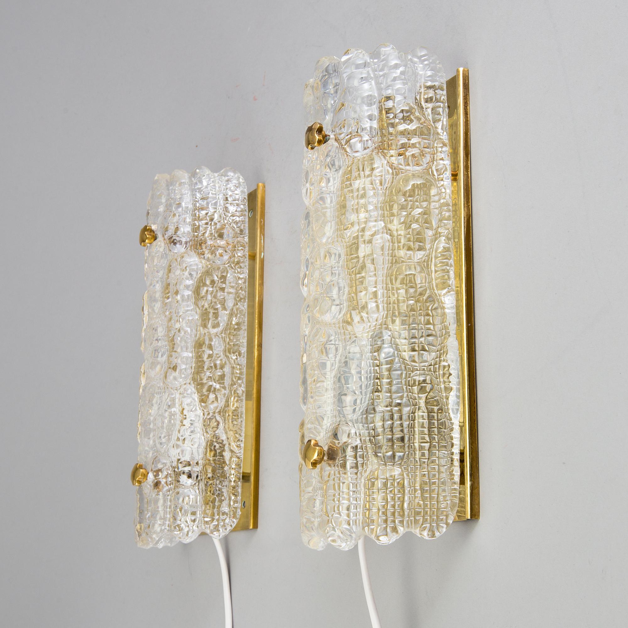 A pair of wall lamps by Carl Fagerlund, 20th century.