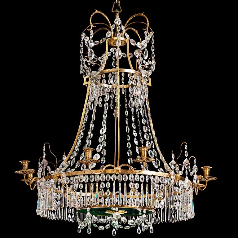 A German Louis XVI ormolu and cut-glass nine-light chandelier attributed to Johann Christoph Ermisch, late 18th century.