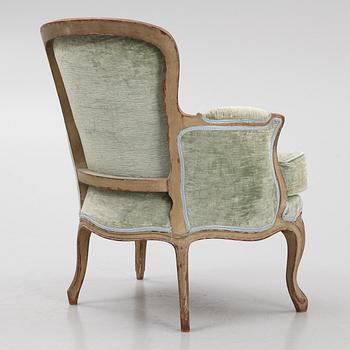 A Louis XV-style Bergère, 20th century.