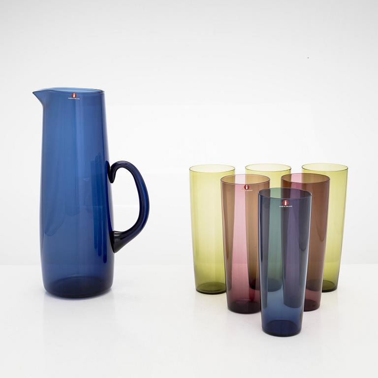 Iittala, a set of 12 glasses by Tapio Wirkkala, model 2204, and a glass pitcher by Erkki Vesanto, model 2438.