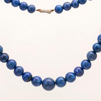A set of lapis lazuli earrings and necklace.