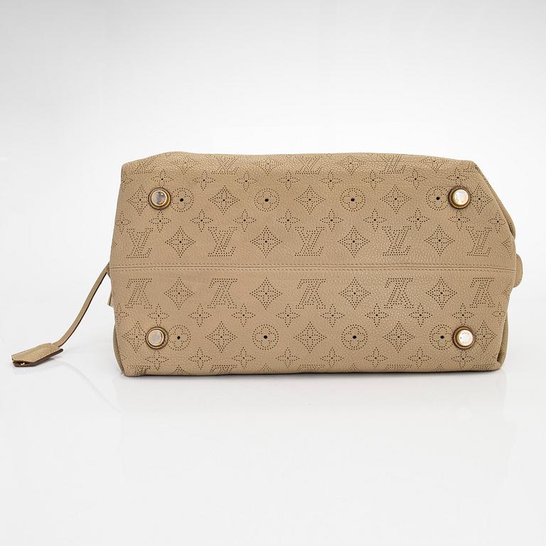 Louis Vuitton, a 'Mahina Galatea MM' bag.