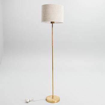 PAAVO TYNELL, A FLOOR LAMP. Manufactured by Idman. 1940s.