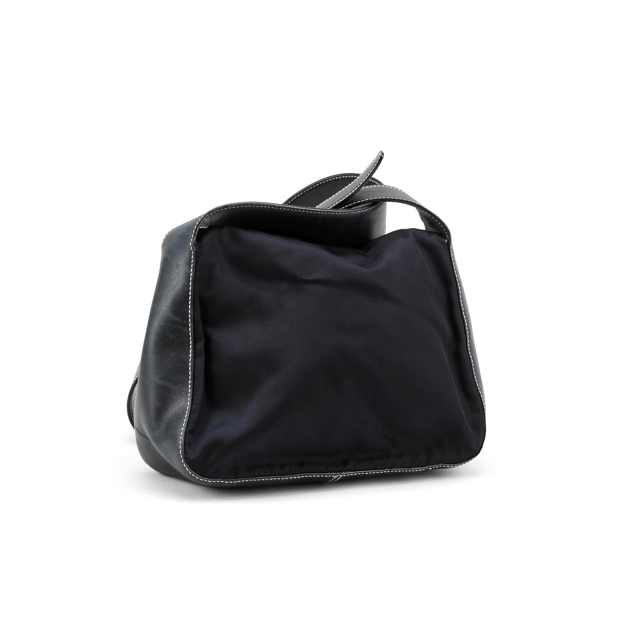 PRADA, a blue nylon and leather shoulder bag.