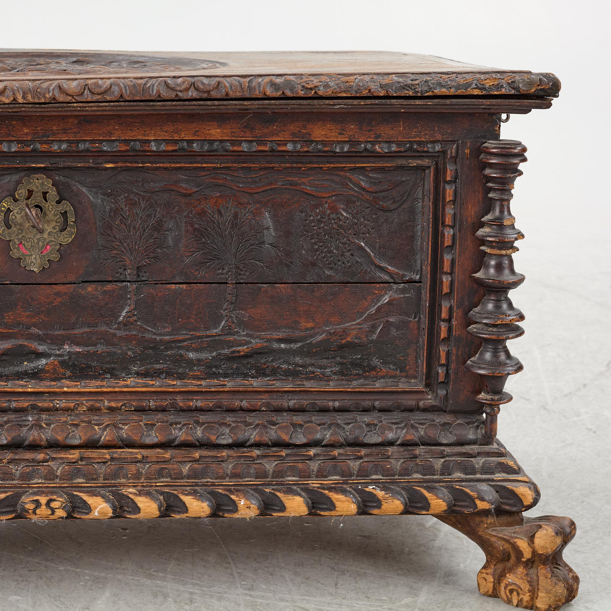A baroque style wooden chest, 19th century.