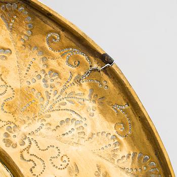 Four mid-17th century Northern and Central European reflectors plates.