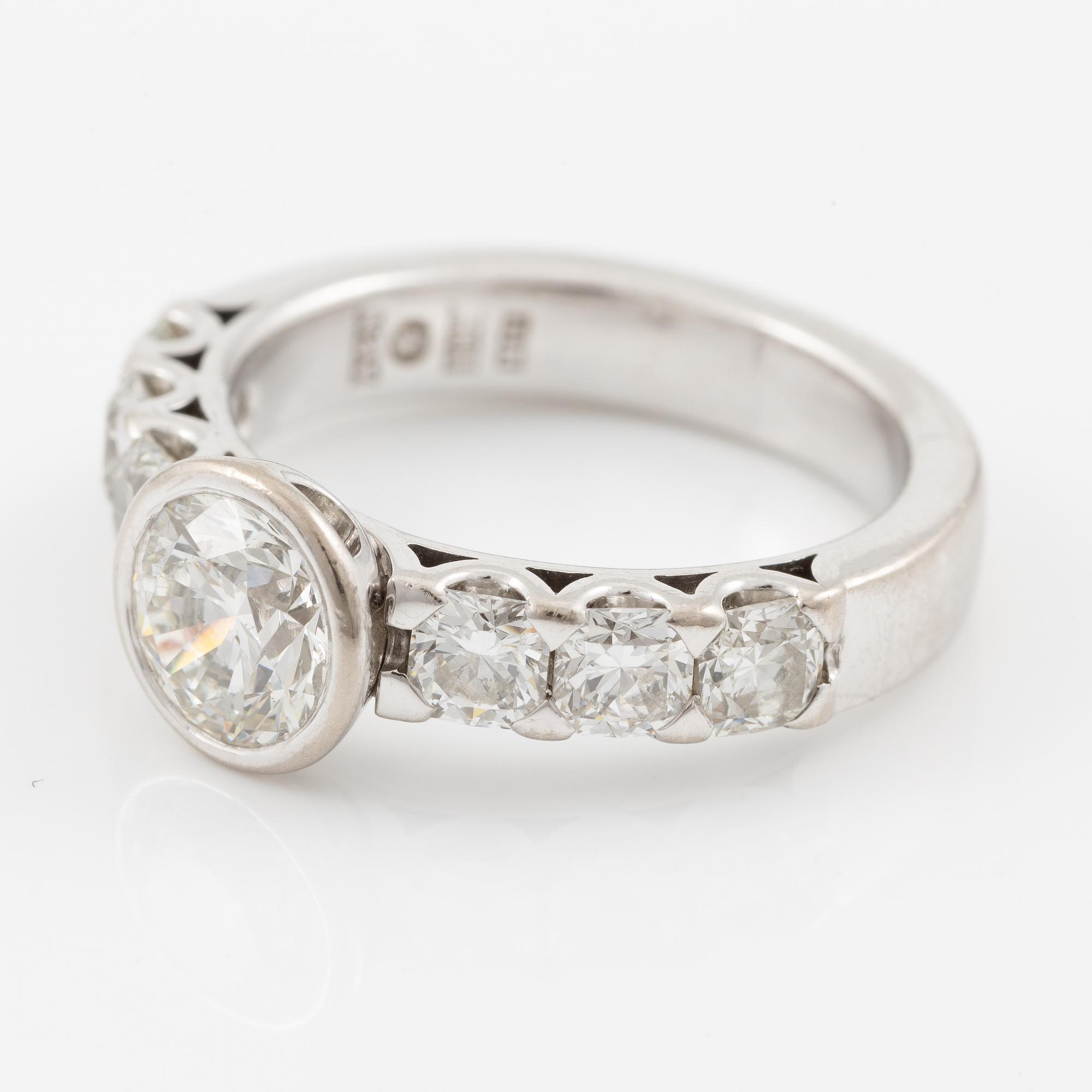 Ring, Atelier Ajour, 18K white gold with a brilliant-cut diamond approximately 1 ct with old mine-cut diamonds.