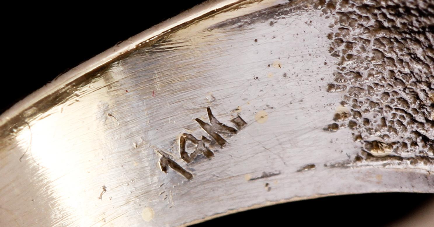 RING, 14K guld med 9 briljantslipade vita stenar. Vikt 3,2 g.