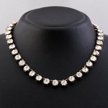 A  RIVIERE NECKLACE, facetted glass, silver, 19th century.