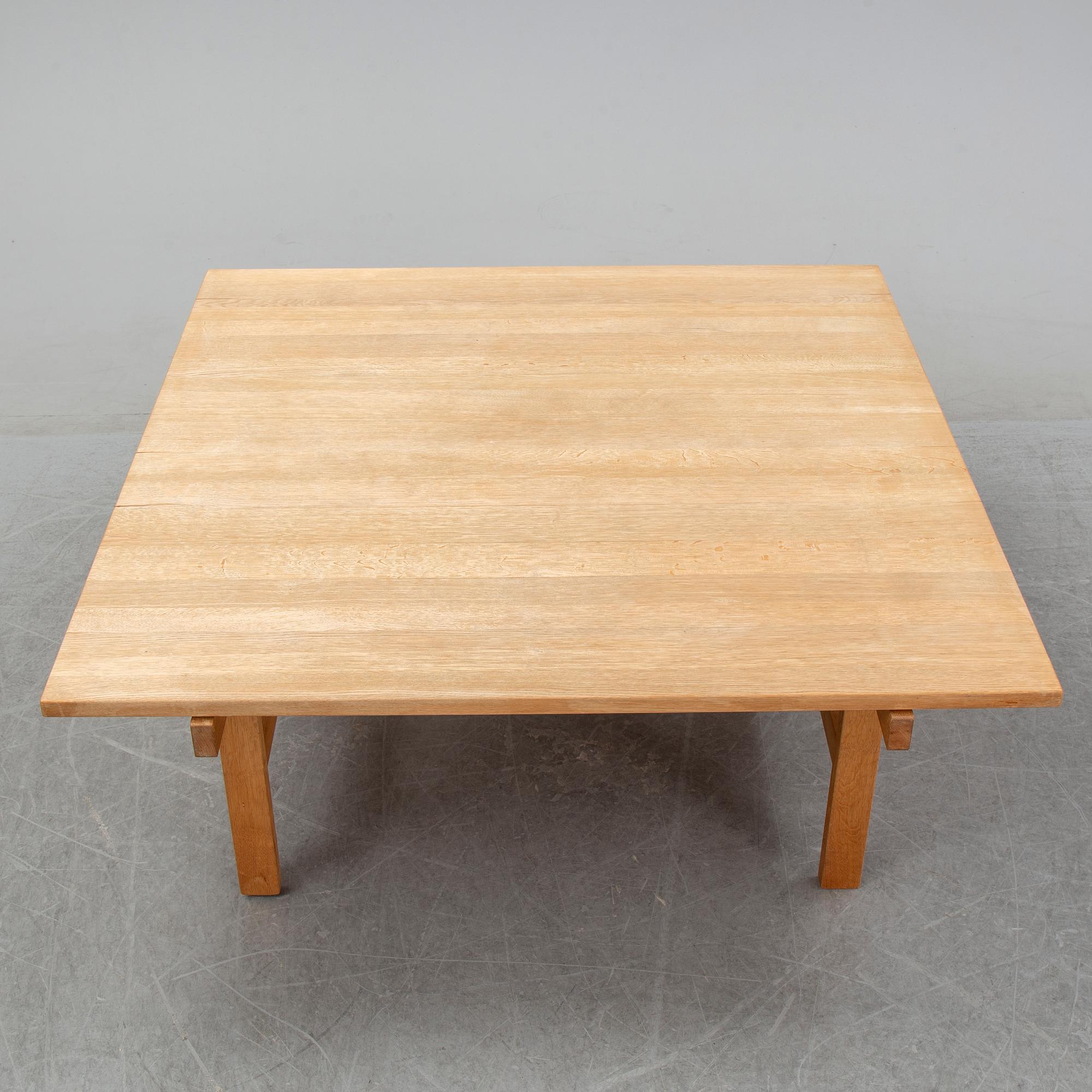 An oak coffee table by Hans J Wegner for Andreas Tuck, Denmark.