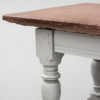 A limestone-top table, Sweden, 18th century.