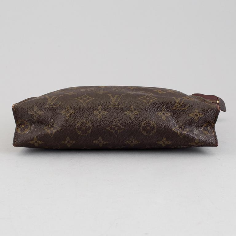 LOUIS VUITTON, a monogram canvas make up bag.