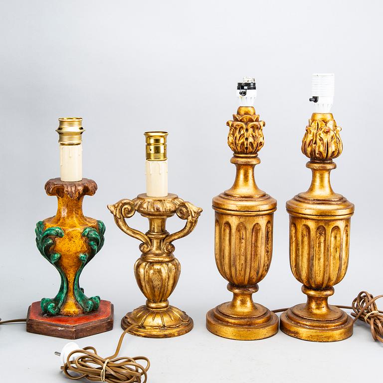 A set of four wood table lamps  from Paoletti, Firenze Italy, second half of 20th century.